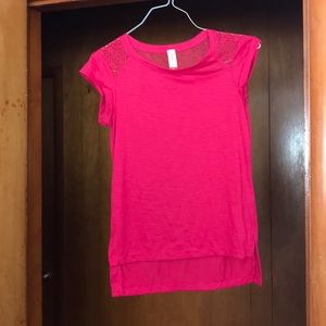 A bright pink short sleeved top